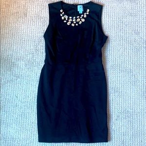 Black cocktail dress with studded collar